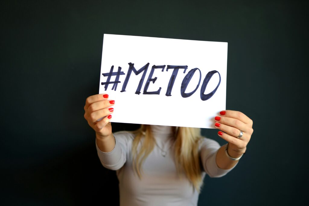 https://unsplash.com/photos/woman-holding-paper-with-metoo-sign-written-DeI2BMIMDFA